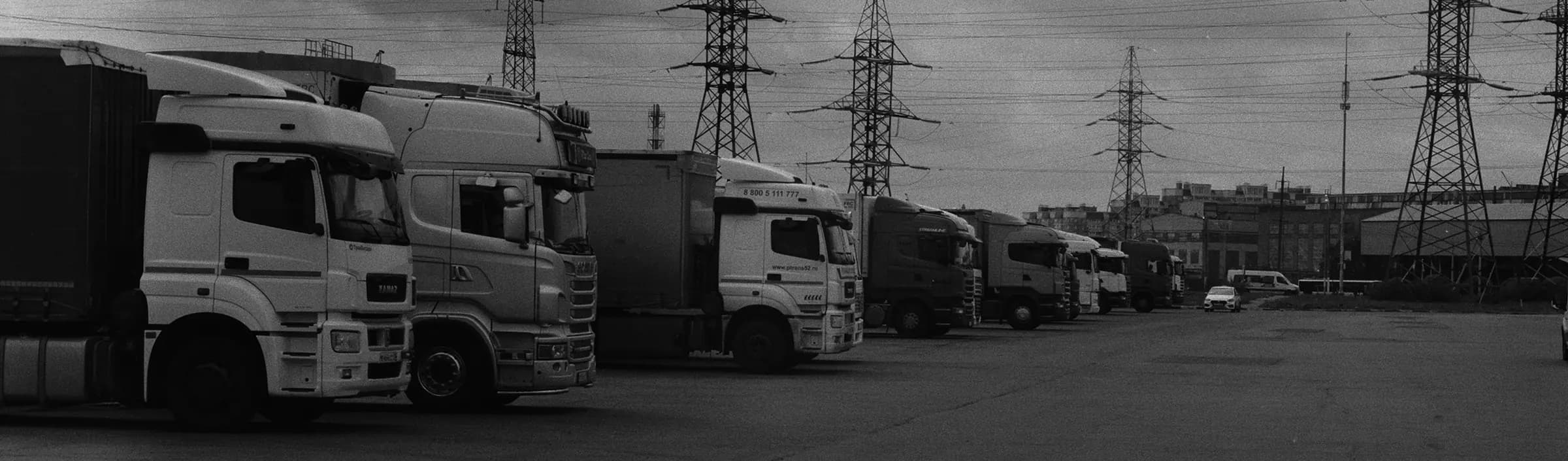 Fleet trucks parked in yard